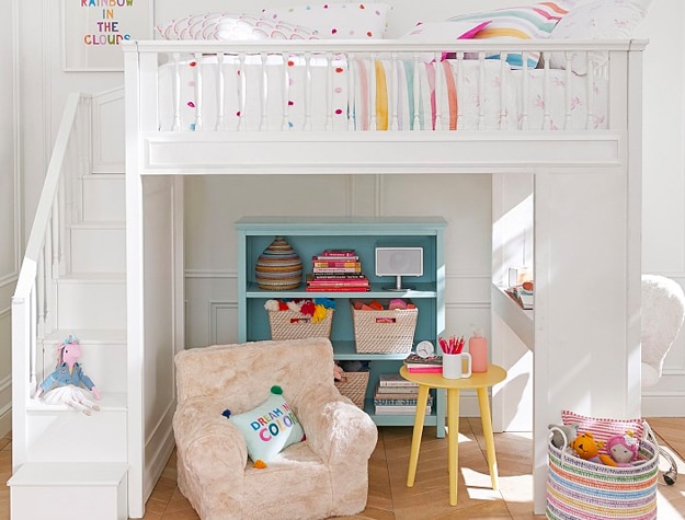 White loft bed with rainbow accents
