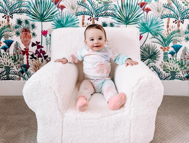 Child sitting in plush sherpa Anywhere Chair