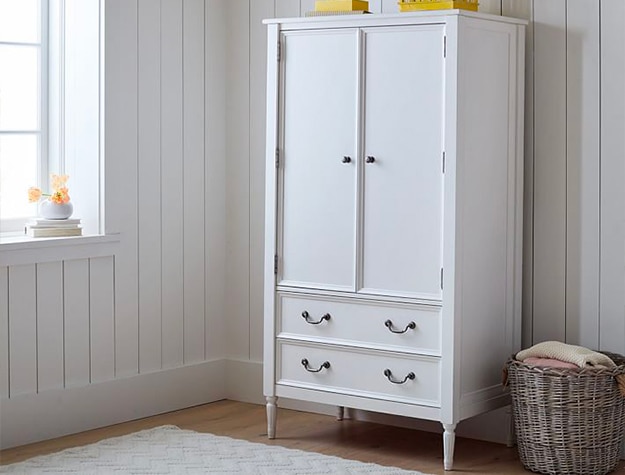 white armoire with black handles