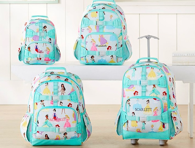 Group of backpacks with monogrammed girls’ names