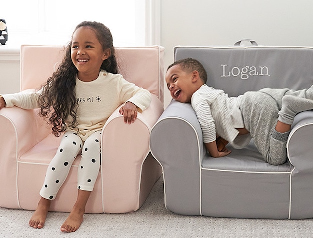 pink and gray children's armchair with white piping