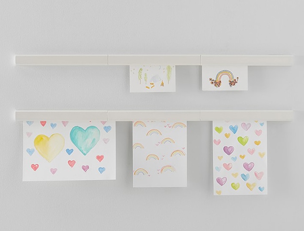 Magnetic wall hangers showing artwork