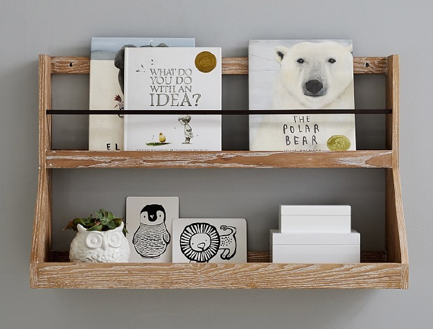 Wooden wall shelf with books