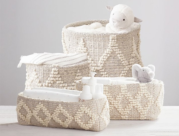 Baby products stored in the Metallic Woven Wool Nursery Storage.