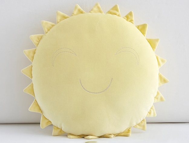 Smiling sun pillow.