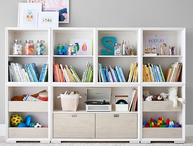 Callum Wall Extra Wide Drawer Base & Cubby Storage Set with kids books and art supplies.
