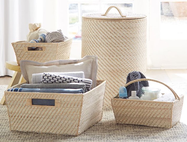 Quinn nursery storage baskets with nursery essentials.