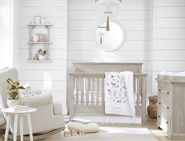 Birch kids shelf in natural themed nursery.