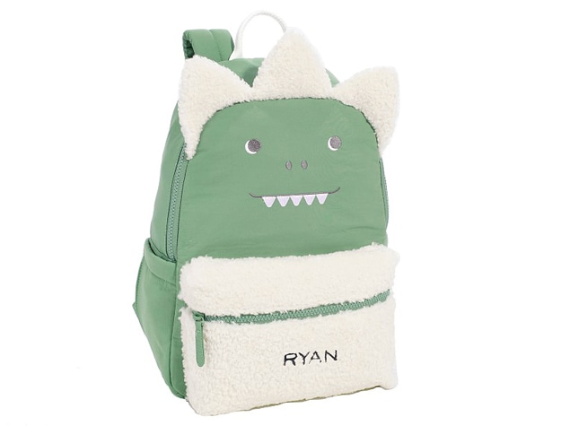 Personalized Colby Olive Dino Critter Backpack reading “Ryan”.