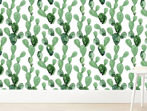 Anewall Cactus Mural with white side table in front of it.