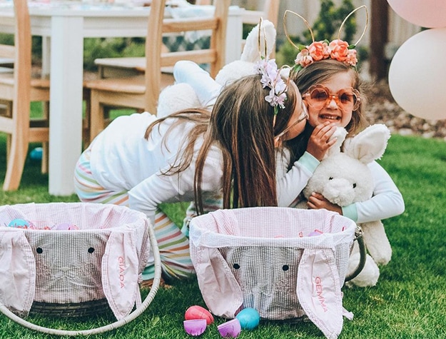Two girls dressed in bunny ears