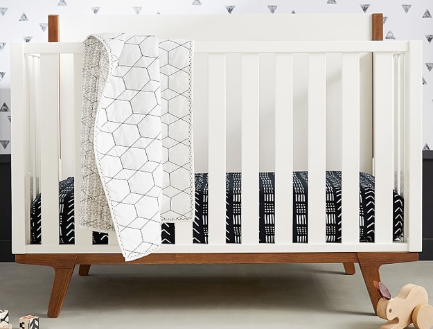 modern 4-in-1 convertible crib with headboard