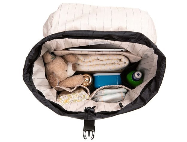 Storksak Travel Eco Backpack with baby essentials.