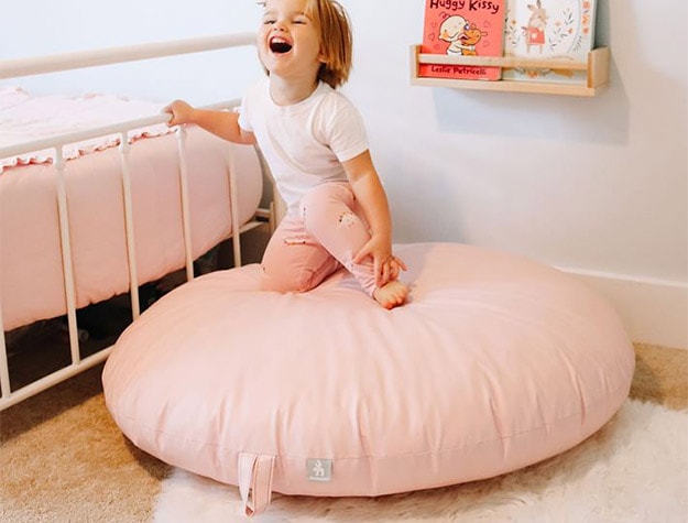 Kid playing on pink Foamnasium Spot.