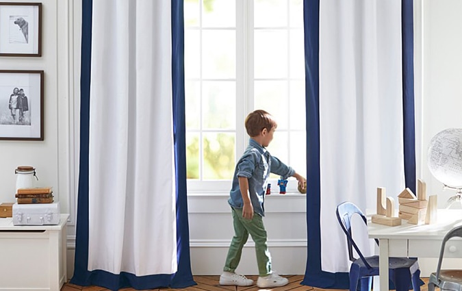 Color bordered blackout curtain panel