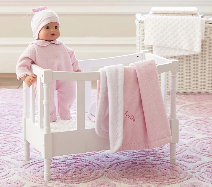 baby doll and crib