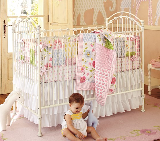 white metal baby crib