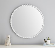 white round mirror nursery