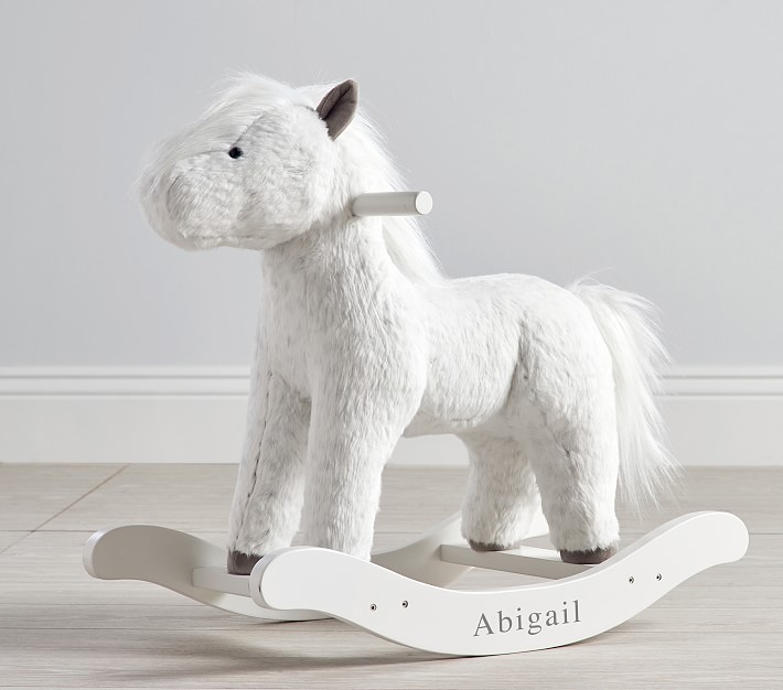 sit on plush horse