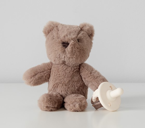 stuffed bear with pacifier