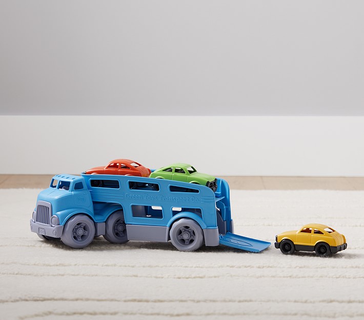 green toys car carrier vehicle