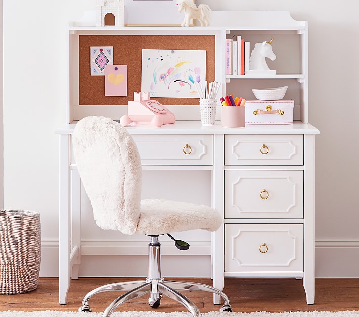 white desk with hutch and cork board