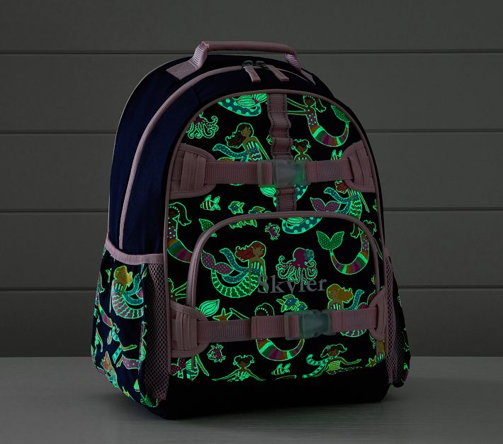 https://assets.pkimgs.com/pkimgs/rk/images/dp/wcm/202320/0147/mackenzie-navy-mermaid-friends-glow-in-the-dark-backpacks-4-o.jpg