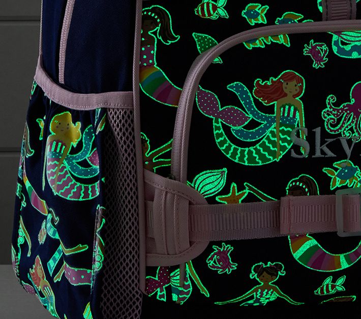 https://assets.pkimgs.com/pkimgs/rk/images/dp/wcm/202322/0139/mackenzie-navy-mermaid-friends-glow-in-the-dark-backpacks-o.jpg