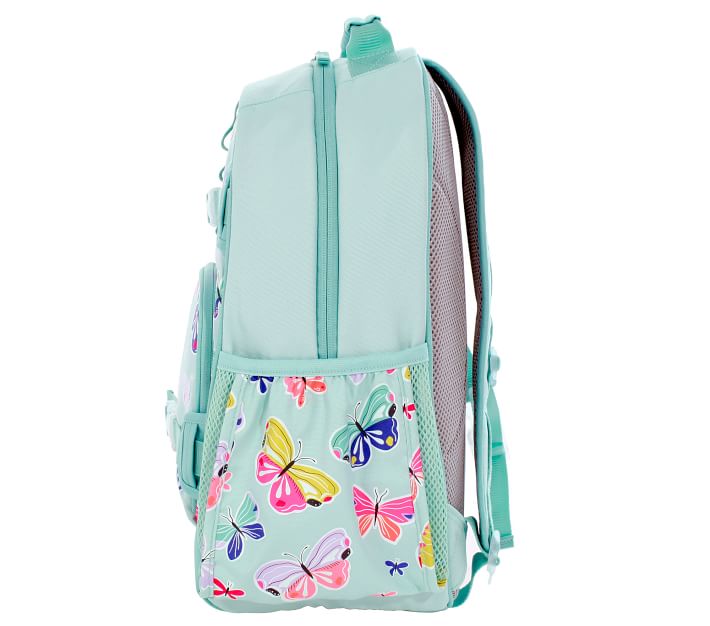 https://assets.pkimgs.com/pkimgs/rk/images/dp/wcm/202326/0021/mackenzie-aqua-spring-butterfly-glow-in-the-dark-backpacks-o.jpg