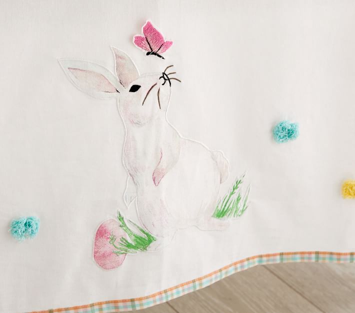 https://assets.pkimgs.com/pkimgs/rk/images/dp/wcm/202329/0145/springtime-bunny-pom-pom-tablecloth-o.jpg