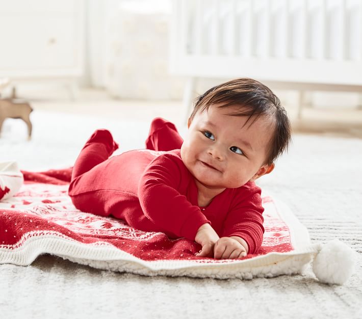 The Perfect Red Holiday Sweater - Julia Berolzheimer