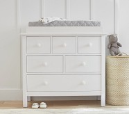 White dresser and store changing table