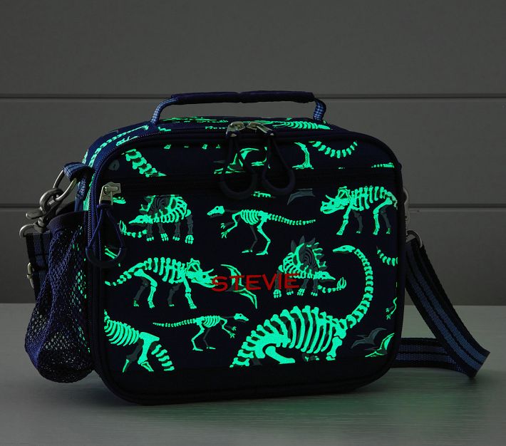 https://assets.pkimgs.com/pkimgs/rk/images/dp/wcm/202347/0026/mackenzie-navy-dino-bone-glow-in-the-dark-adaptive-lunch-b-o.jpg