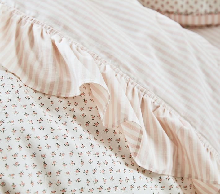 https://assets.pkimgs.com/pkimgs/rk/images/dp/wcm/202350/0076/emily-meritt-striped-ruffle-organic-sheet-set-pillowcases-o.jpg