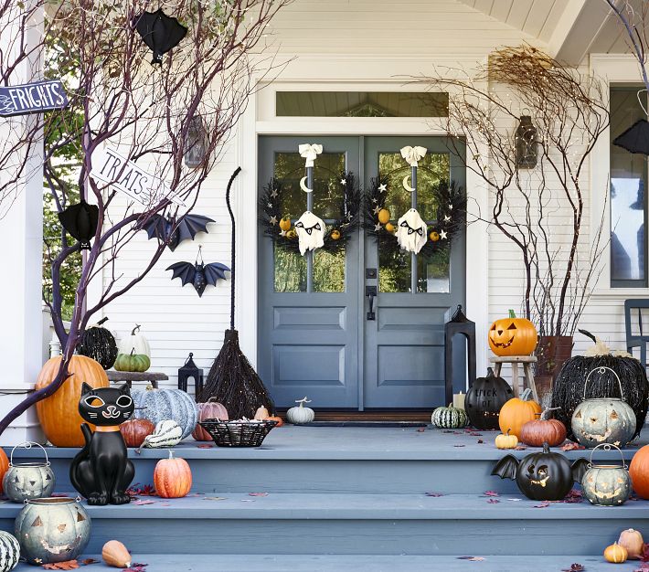 Black pumpkins with colored 2024 stem light up