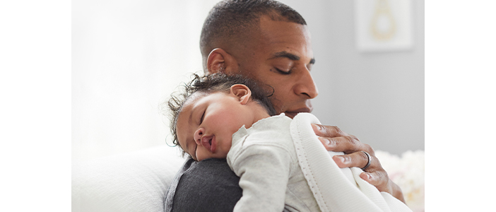 A dad and his baby.